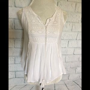 White sleeveless peasant top